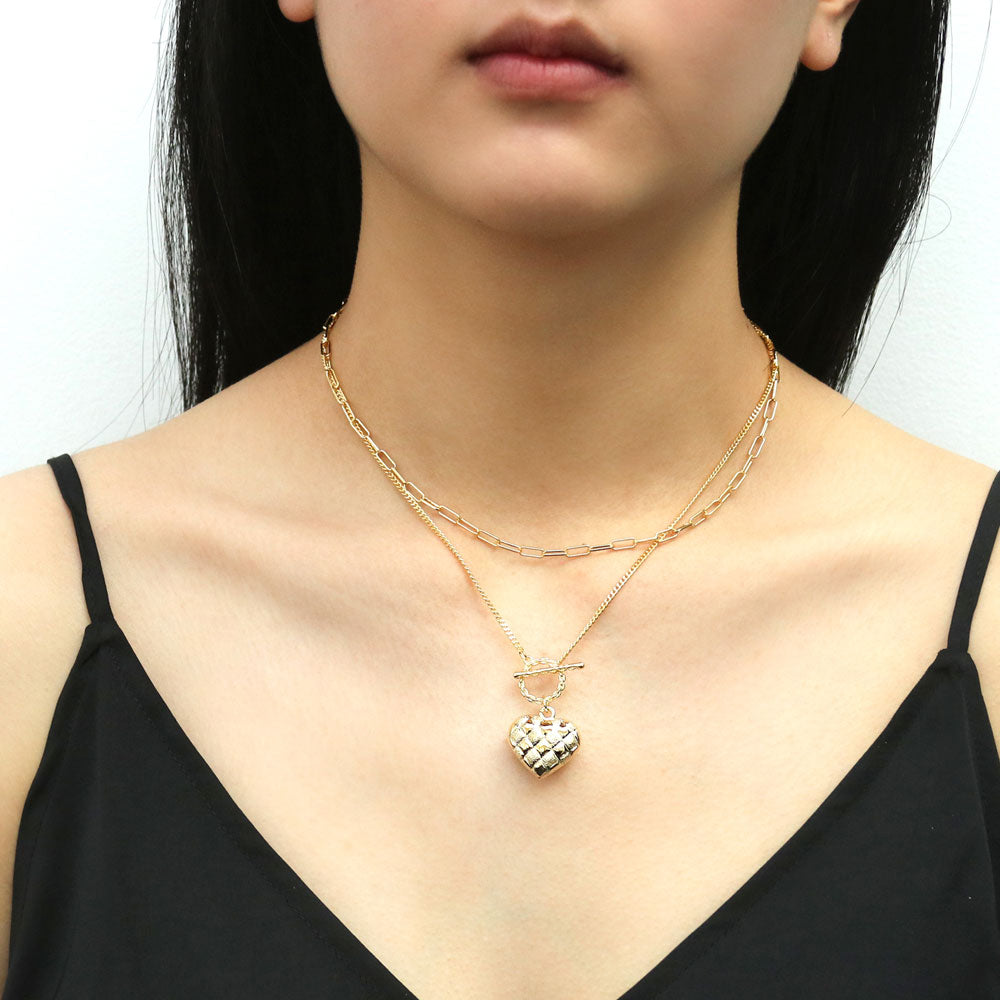 Model wearing Heart Checkerboard Toggle Pendant Necklace, Yellow Gold Flashed