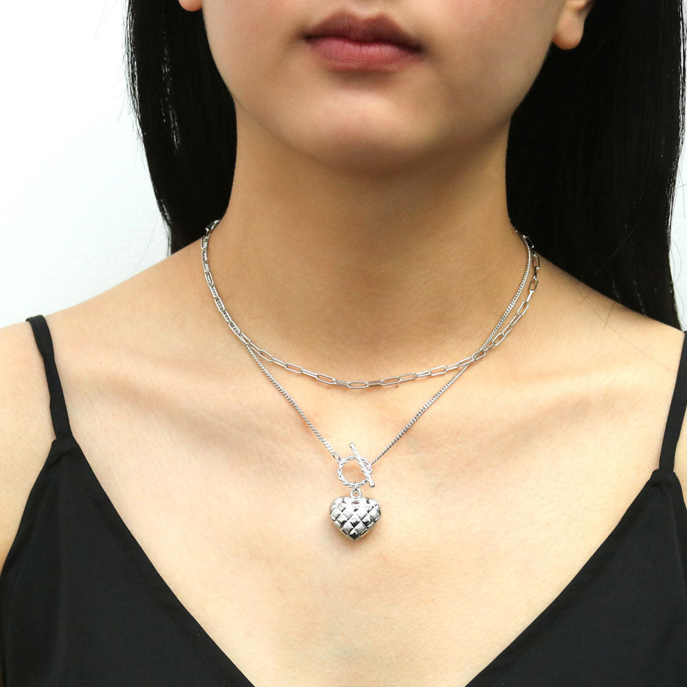 Model wearing Heart Checkerboard Toggle Pendant Necklace, Rhodium Plated