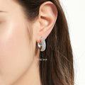 Model wearing Dome CZ Small Hoop Earrings in Sterling Silver, 0.82 inch