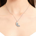Model wearing Feather CZ Pendant Necklace in Sterling Silver, Yellow Gold Flashed