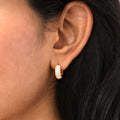 Model wearing Dome CZ Mini Cartilage Huggie Earrings in Sterling Silver 0.5 inch, Gold Flashed