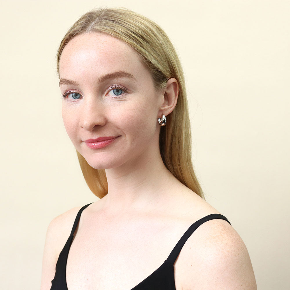 Model wearing Dome Small Hoop Earrings in Sterling Silver 0.8-1 inch, 2 Pairs, Rhodium Plated