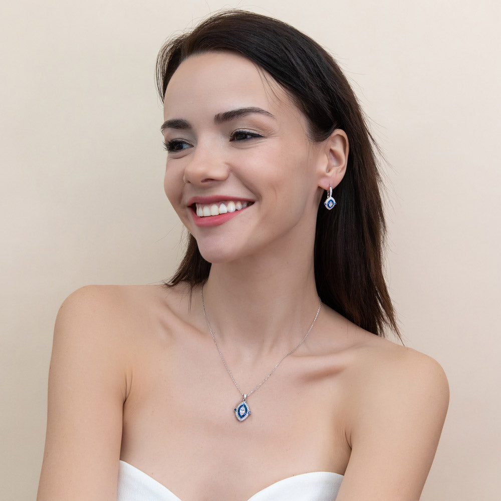 Model wearing Navette Halo Art Deco Milgrain CZ Earrings in Sterling Silver, 3 of 7
