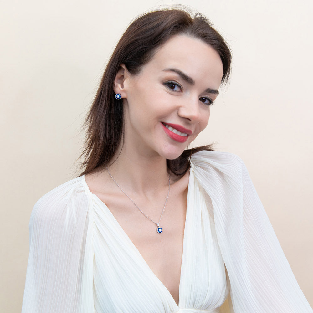 Model wearing Halo Art Deco Milgrain CZ Stud Earrings in Sterling Silver, 3 of 8