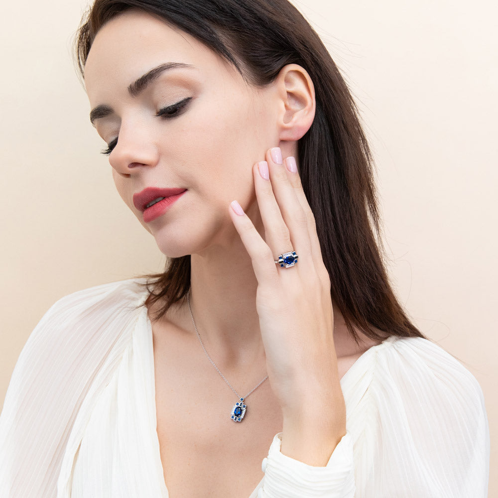 Model wearing Art Deco Simulated Blue Sapphire CZ Pendant Necklace in Sterling Silver, 3 of 9