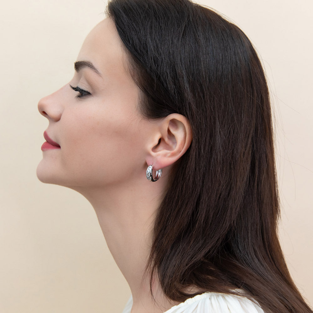 Model wearing Dome CZ Small Hoop Earrings in Sterling Silver 0.8 inch, 2 of 9