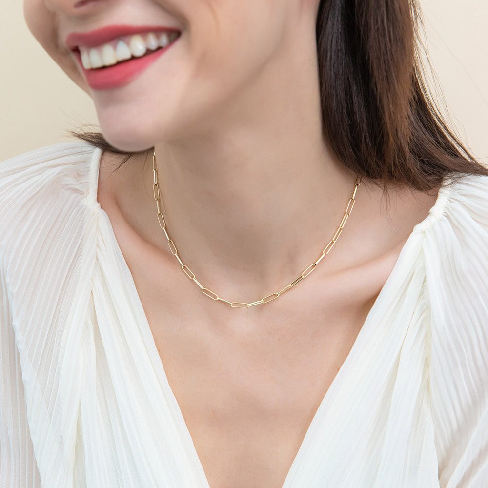 Model wearing Hamsa Hand CZ Chain Necklace in Gold Flashed Sterling Silver, 2 Piece, 2 of 17