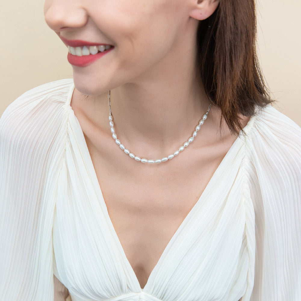 Model wearing Paperclip White Oval Cultured Pearl Chain Necklace in Sterling Silver, 6 of 18