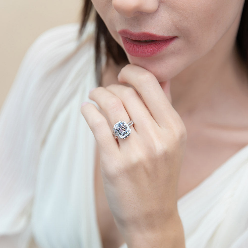 Model wearing Halo Art Deco Step Emerald Cut CZ Ring in Sterling Silver, 3 of 9