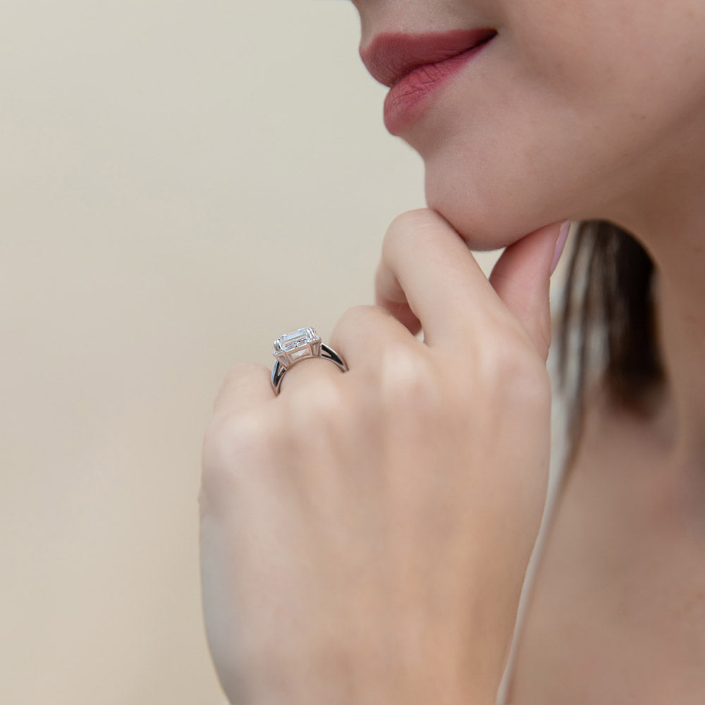 Model wearing Halo Art Deco Emerald Cut CZ Ring in Sterling Silver, 7 of 10