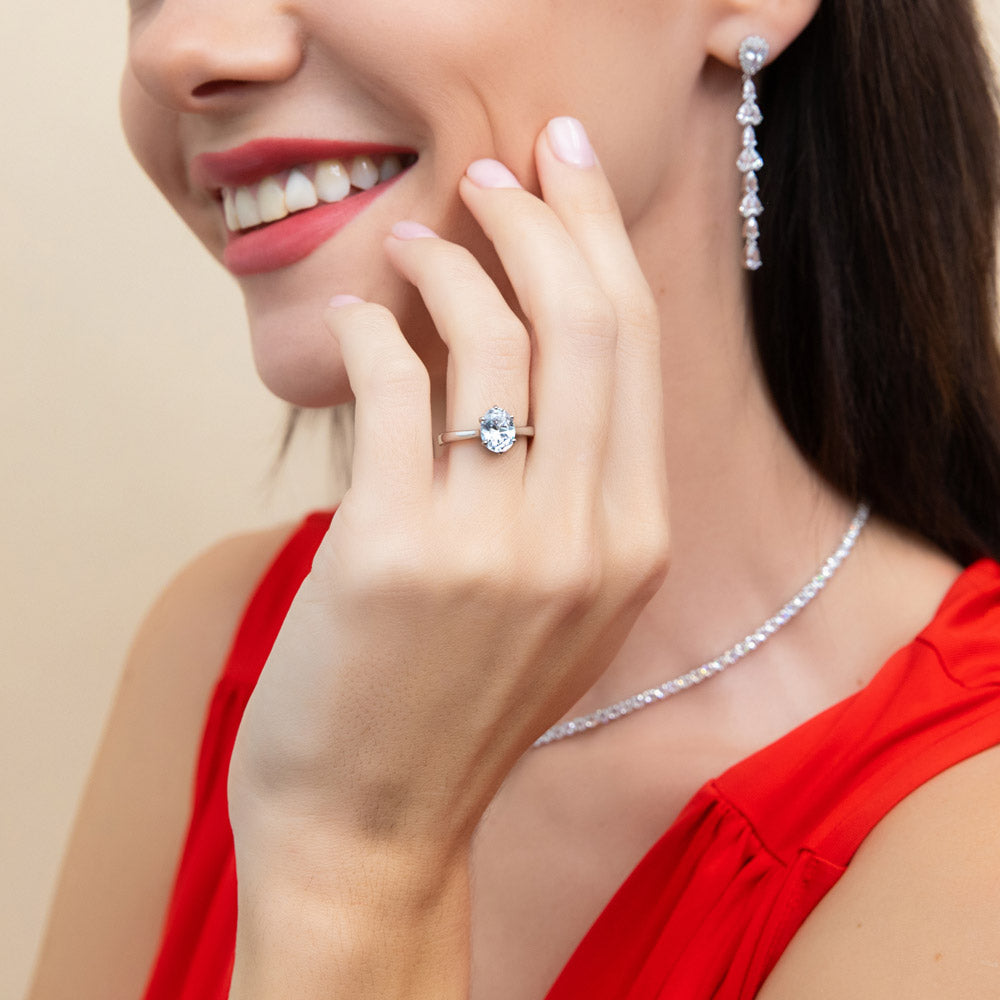 Model wearing Teardrop CZ Chandelier Earrings in Sterling Silver, 7 of 10