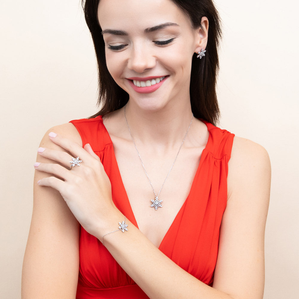Model wearing Snowflake CZ Necklace and Earrings Set in Sterling Silver
