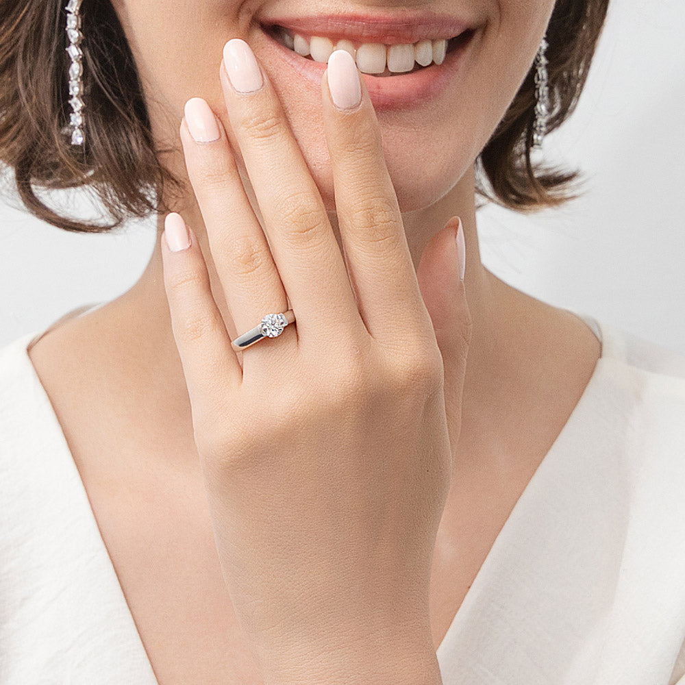 Model wearing Solitaire 0.8ct Bezel CZ Ring in Sterling Silver, 2 of 12