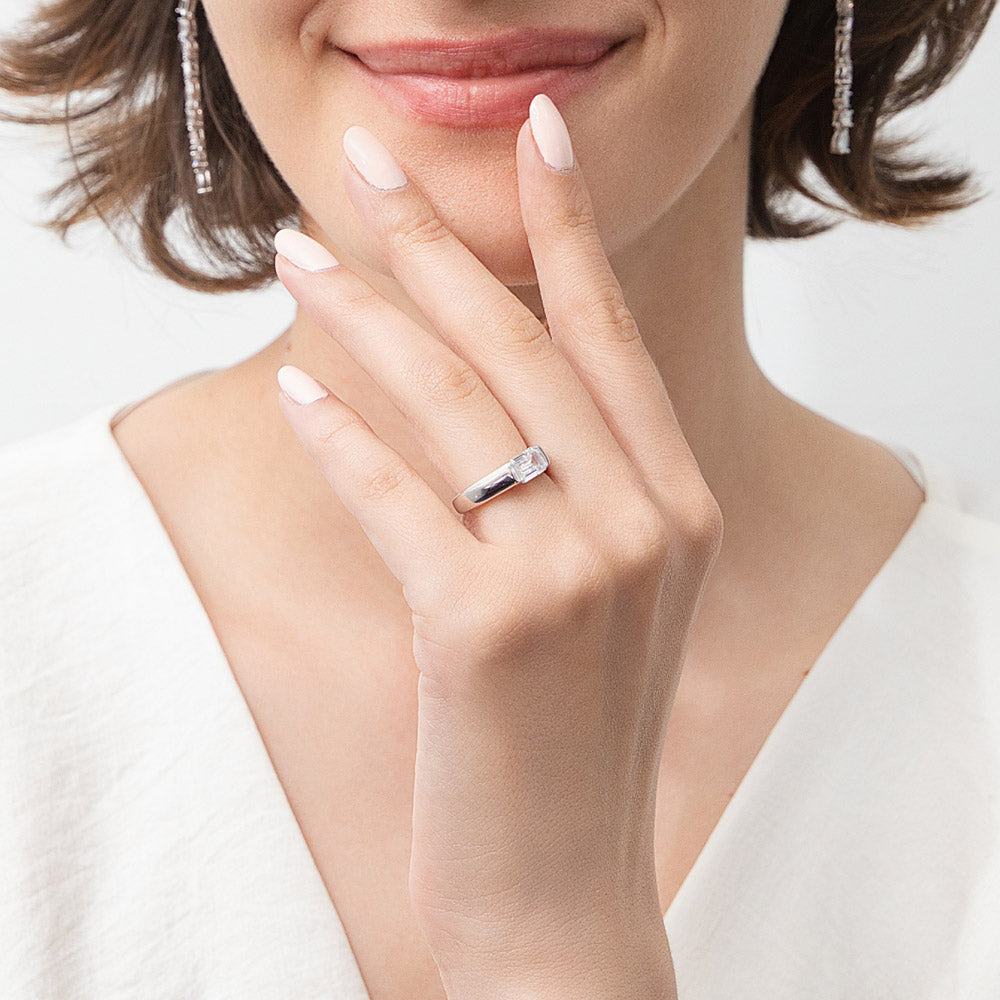 Model wearing East-West Solitaire 1ct Bezel CZ Ring in Sterling Silver, 7 of 13
