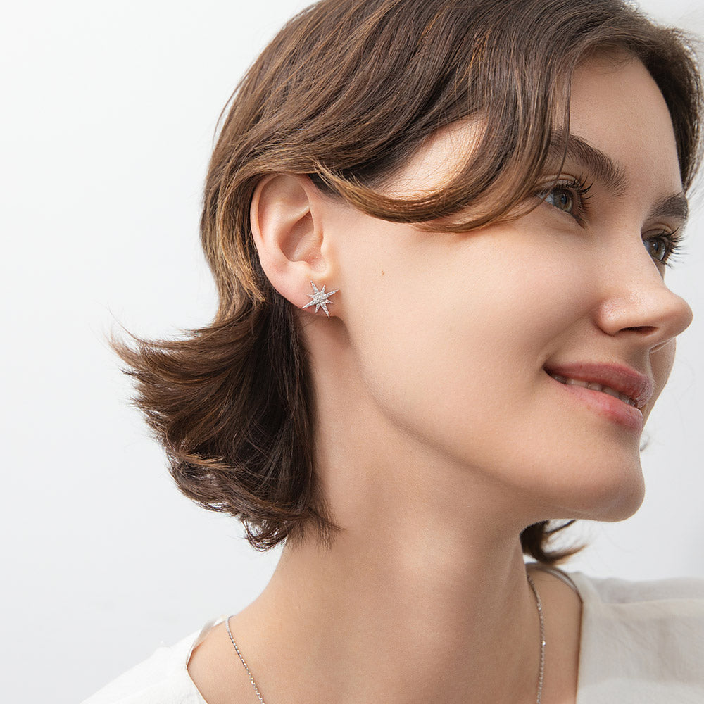 Model wearing North Star CZ Stud Earrings in Sterling Silver, Yellow Gold Flashed
