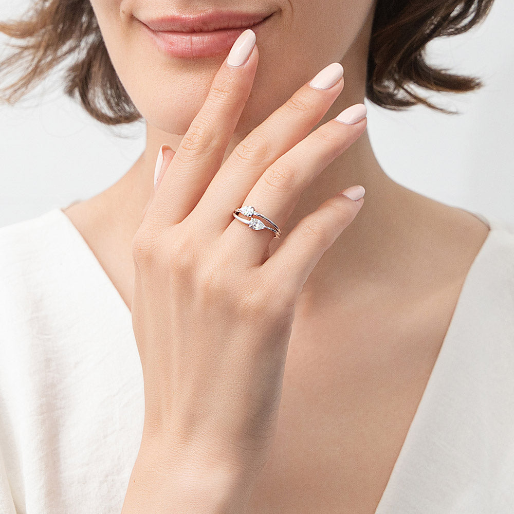 Model wearing Bypass 2-Stone CZ Split Shank Ring in Sterling Silver, 2 of 9