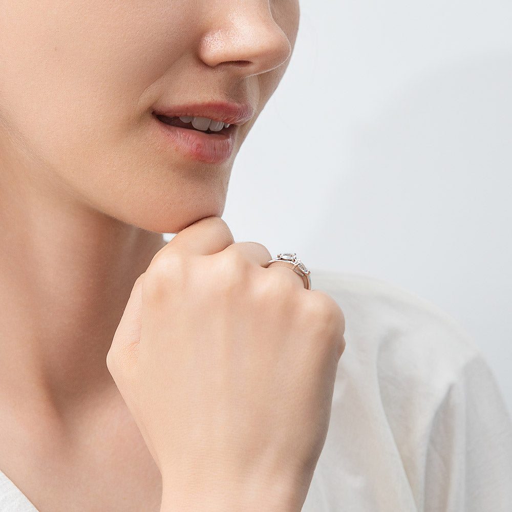 Model wearing Bypass 2-Stone CZ Split Shank Ring in Sterling Silver, 3 of 9