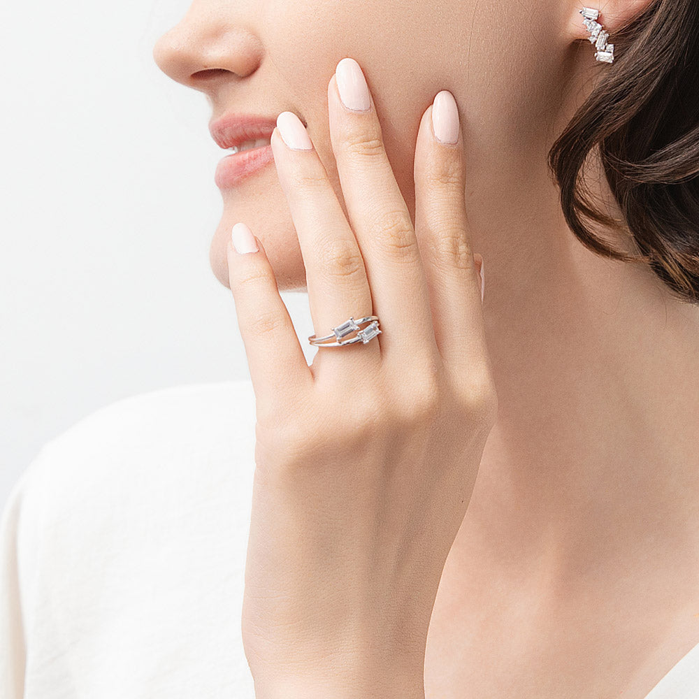 Model wearing Bypass 2-Stone CZ Split Shank Ring in Sterling Silver, 2 of 9