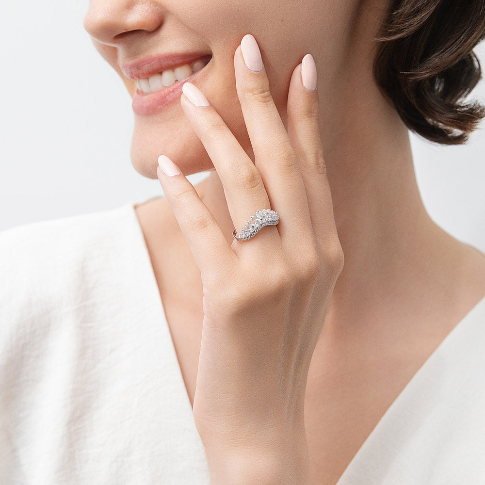 Model wearing Solitaire Chevron Crown Graduated CZ Ring Set in Sterling Silver, 16 of 19