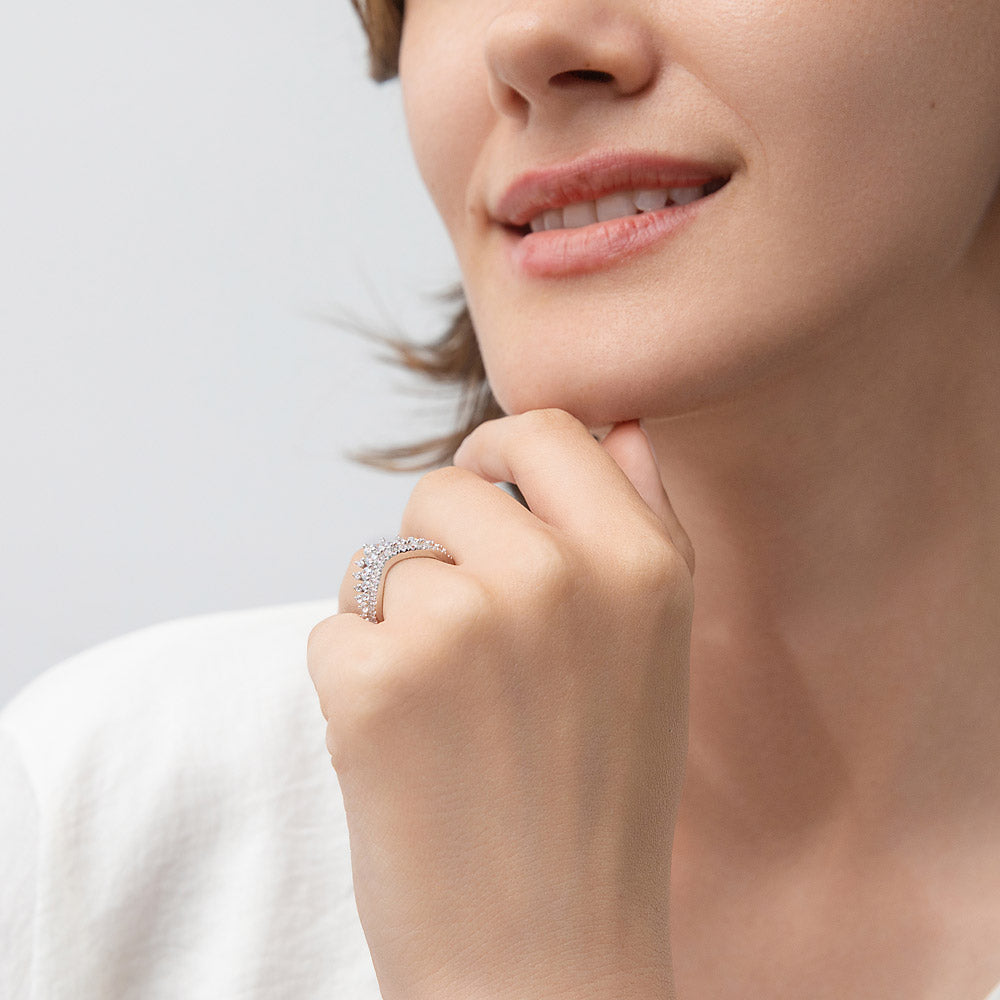 Model wearing Solitaire Chevron Crown Graduated CZ Ring Set in Sterling Silver, 18 of 19