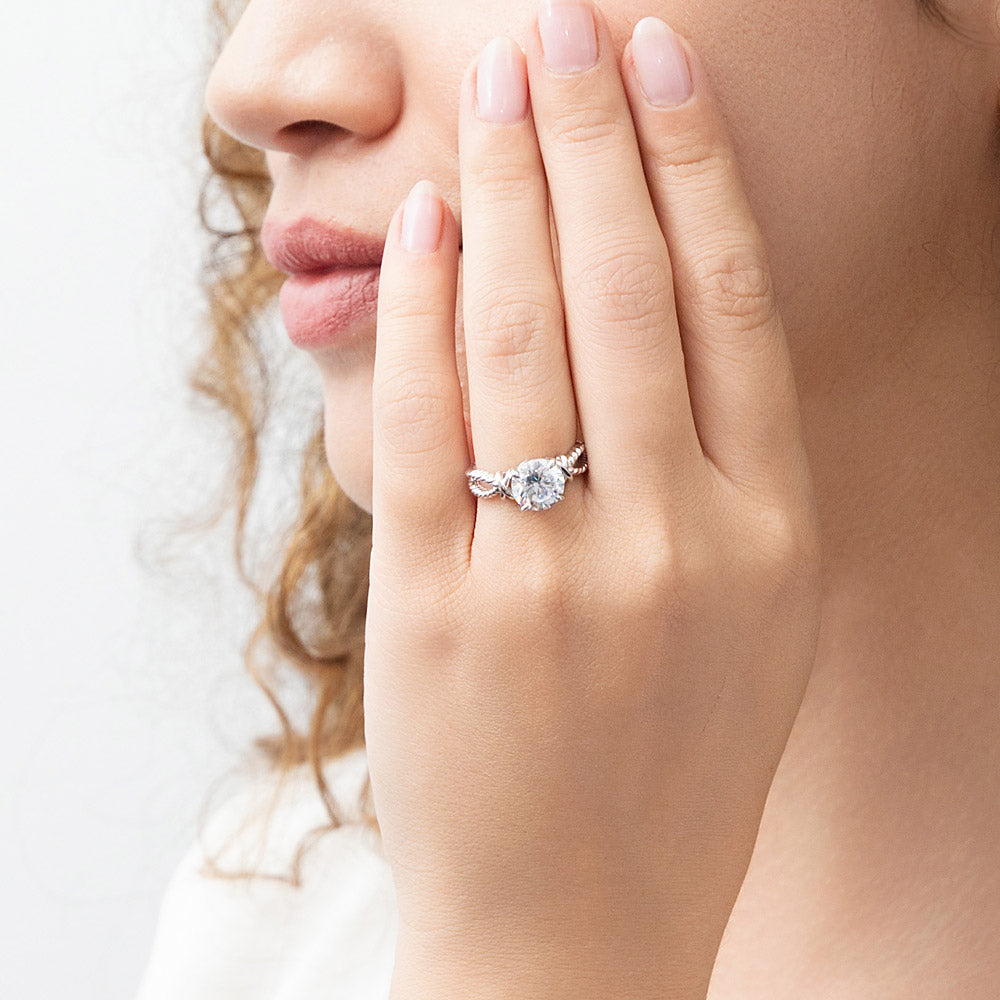 Model wearing Cable Woven Solitaire 2ct CZ Ring in Sterling Silver, 2 of 12