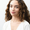 Model wearing Station CZ Station Necklace in Sterling Silver, Yellow Gold Flashed / 16 inch + 2 inch extension