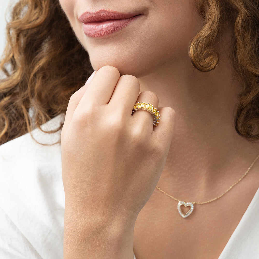 Model wearing Canary Yellow Pave Radiant CZ Eternity Ring in Sterling Silver, 10 of 11