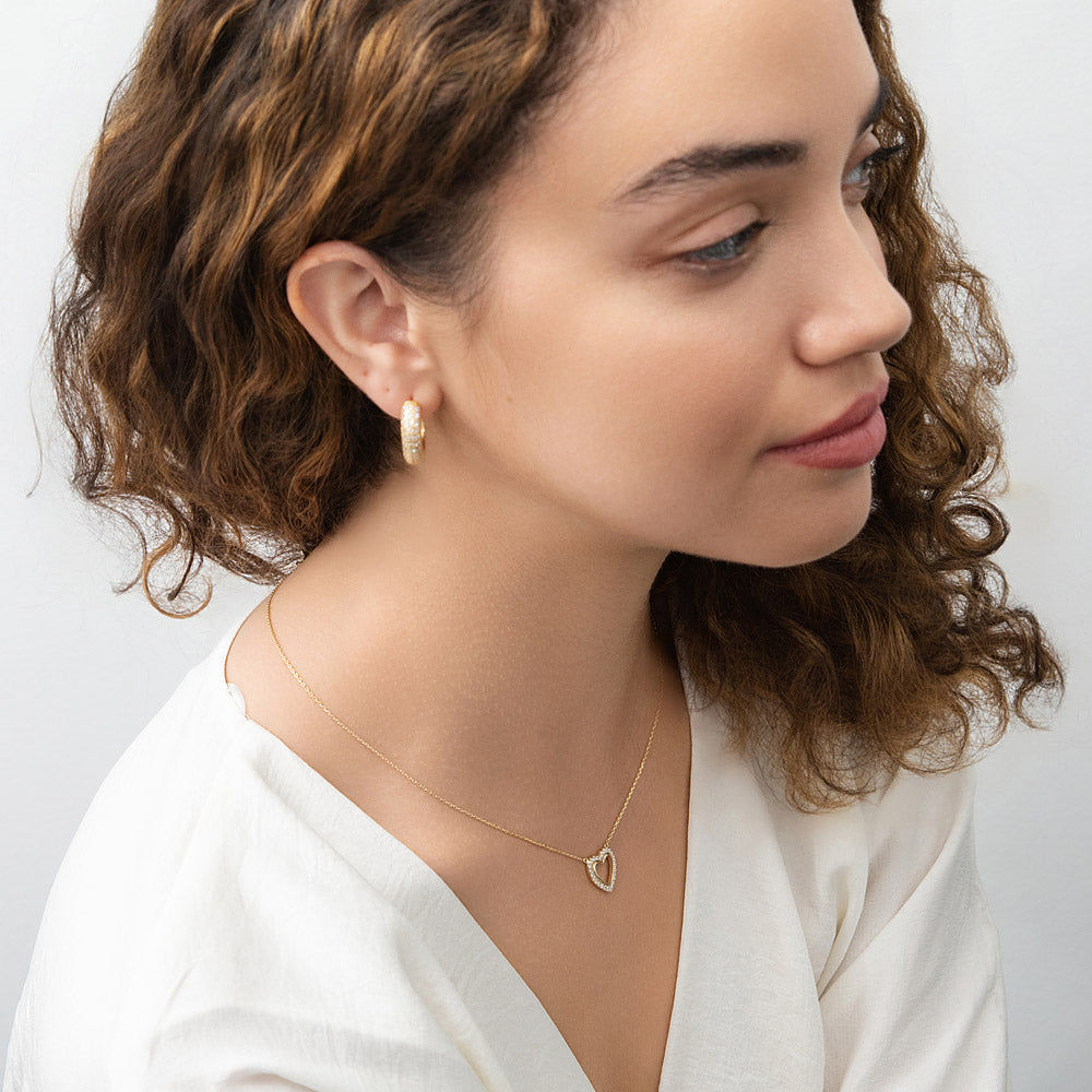 Model wearing Dome CZ Small Hoop Earrings 0.8 inch, Gold-Tone