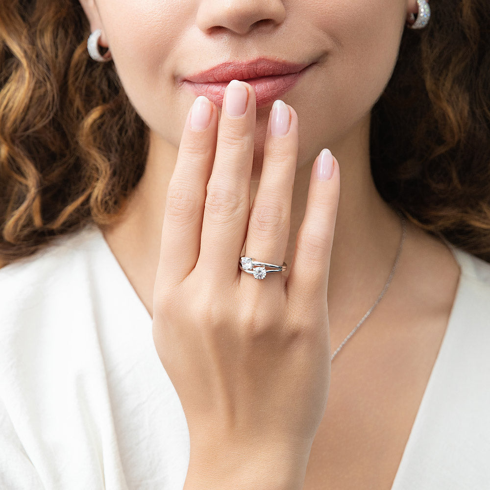 Model wearing Bypass 2-Stone CZ Split Shank Ring in Sterling Silver, 2 of 11