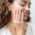 Model wearing Dome CZ Small Huggie Earrings in Sterling Silver 0.6 inch, Rhodium Plated, Cubic Zirconia