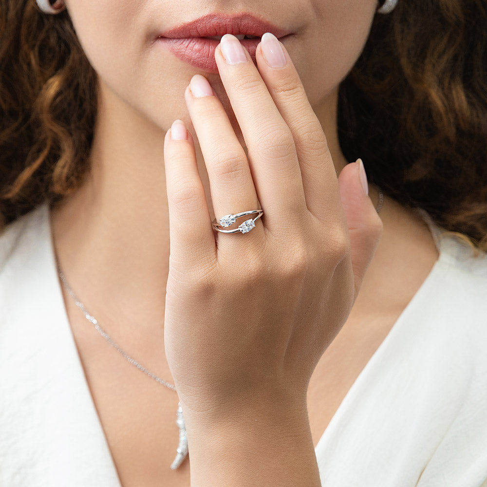 Model wearing Bypass 2-Stone CZ Split Shank Ring in Sterling Silver, 3 of 12