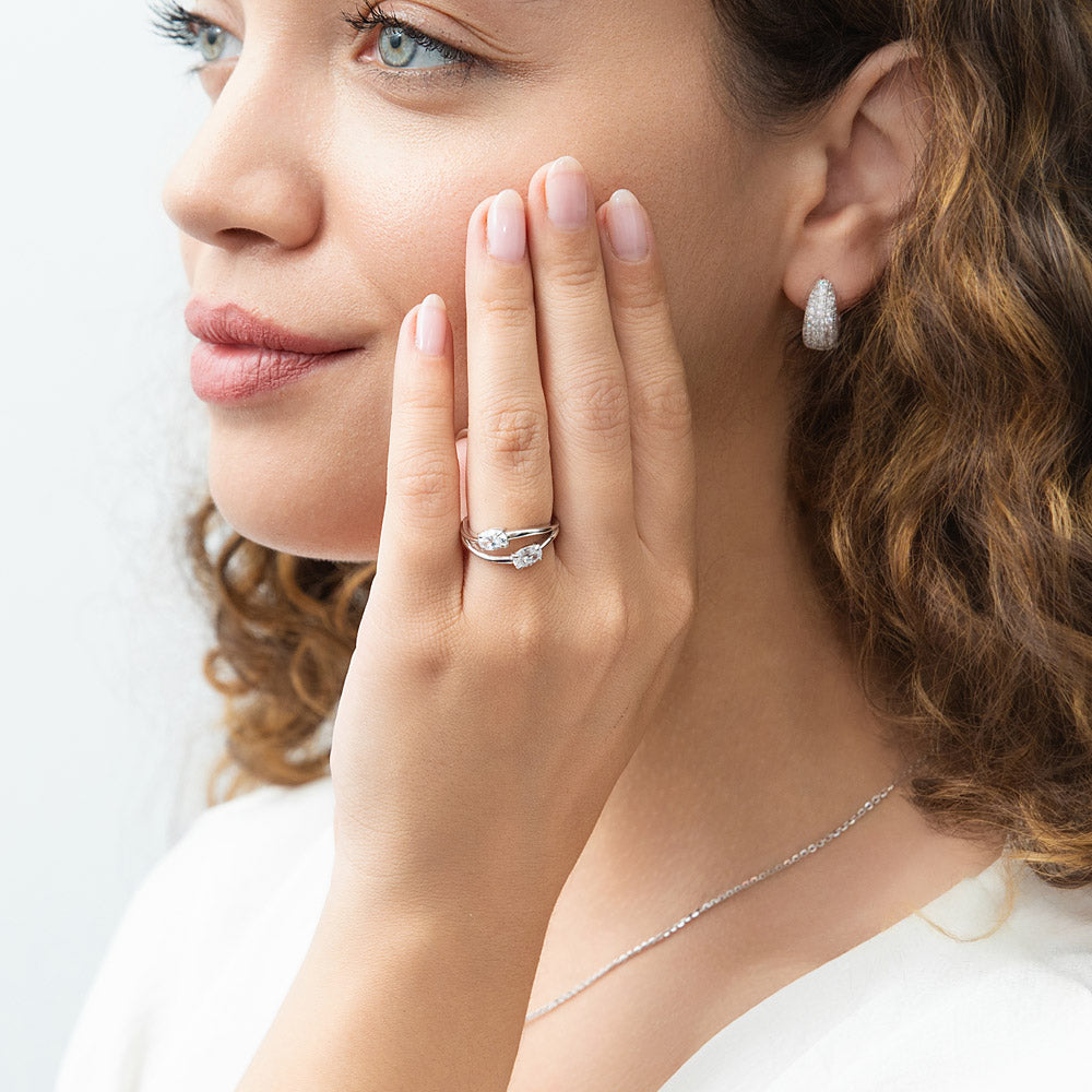 Model wearing Bypass 2-Stone CZ Split Shank Ring in Sterling Silver, 2 of 12