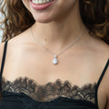 Model wearing Halo Clover Oval CZ Necklace in Sterling Silver, Red Color