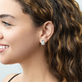 Model wearing Key and Lock CZ Stud Earrings in Sterling Silver, Clear Color