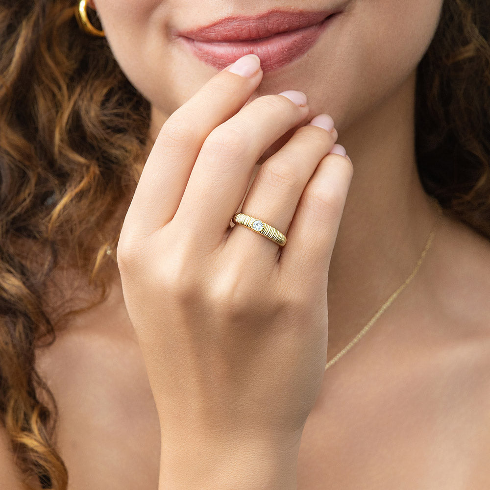 Model wearing Solitaire Bezel CZ Ring in Gold Flashed Sterling Silver, 2 of 9