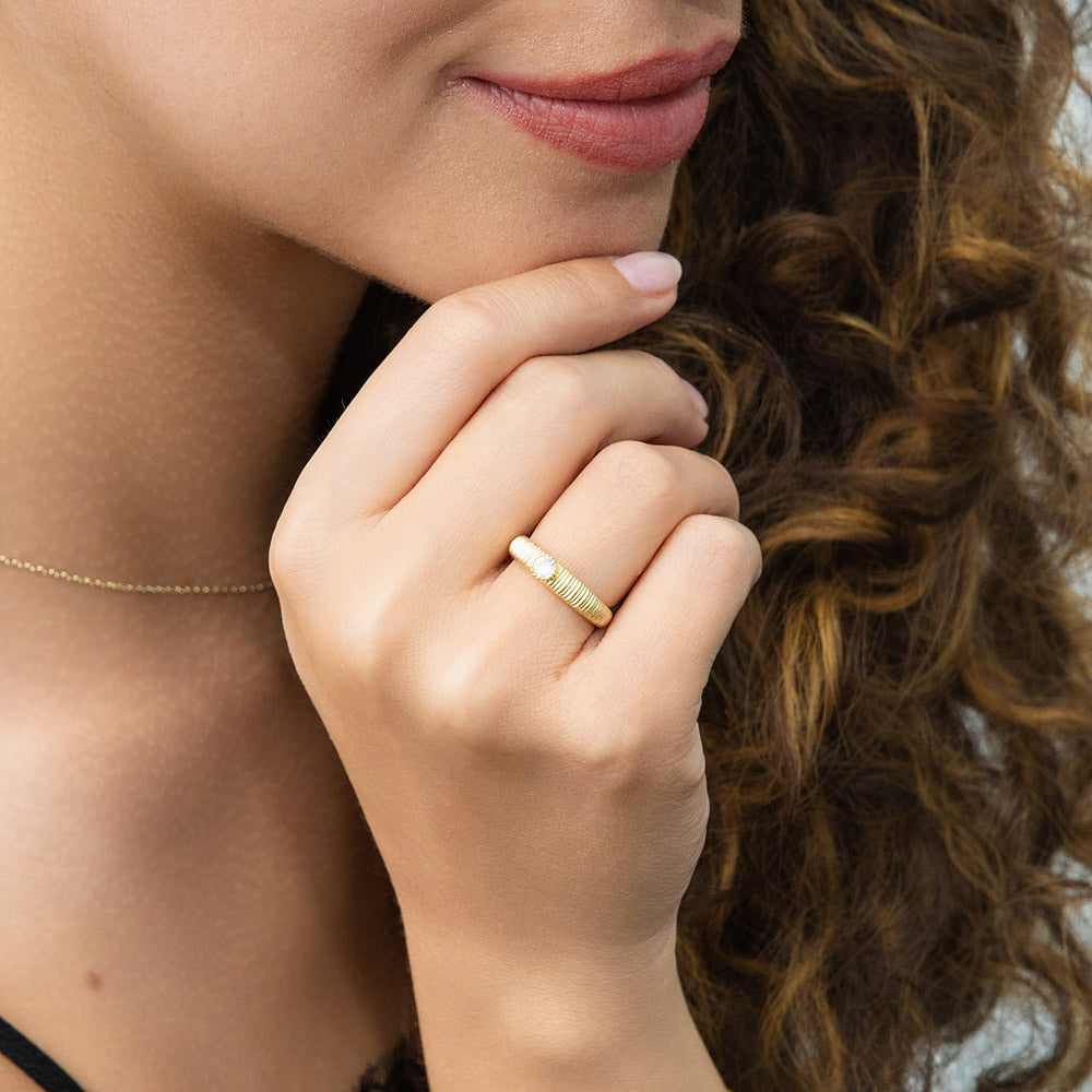 Model wearing Solitaire Bezel CZ Ring in Gold Flashed Sterling Silver, 3 of 9