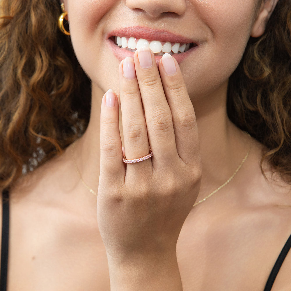 Model wearing Pink CZ Eternity Ring in Rose Gold Flashed Sterling Silver, 6 of 7