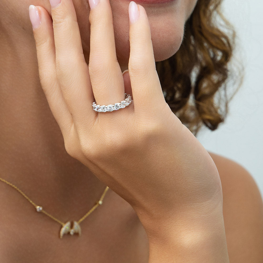 Model wearing Pave CZ Eternity Ring in Gold Flashed Sterling Silver, 2 of 9