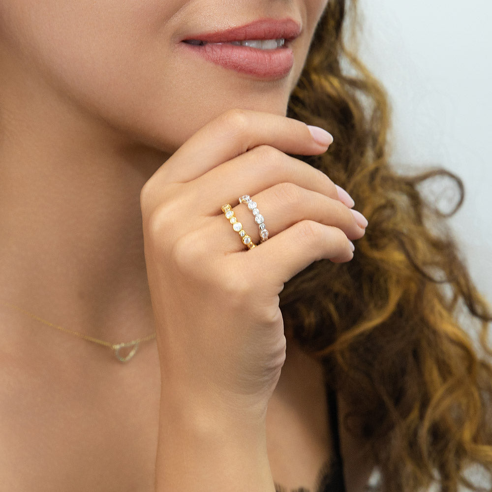 Model wearing Bubble Bezel CZ Eternity Ring Set in Gold Flashed Sterling Silver, 2 of 13