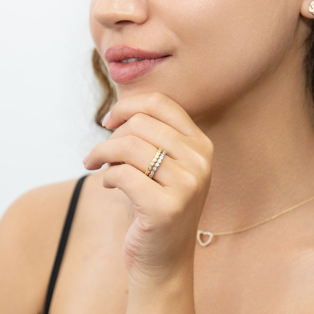 Model wearing Bubble Bezel CZ Eternity Ring Set in Gold Flashed Sterling Silver, 5 of 14