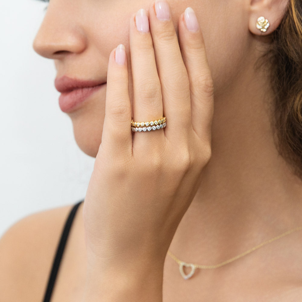 Model wearing Bubble Bezel CZ Eternity Ring Set in Gold Flashed Sterling Silver, 2 of 14