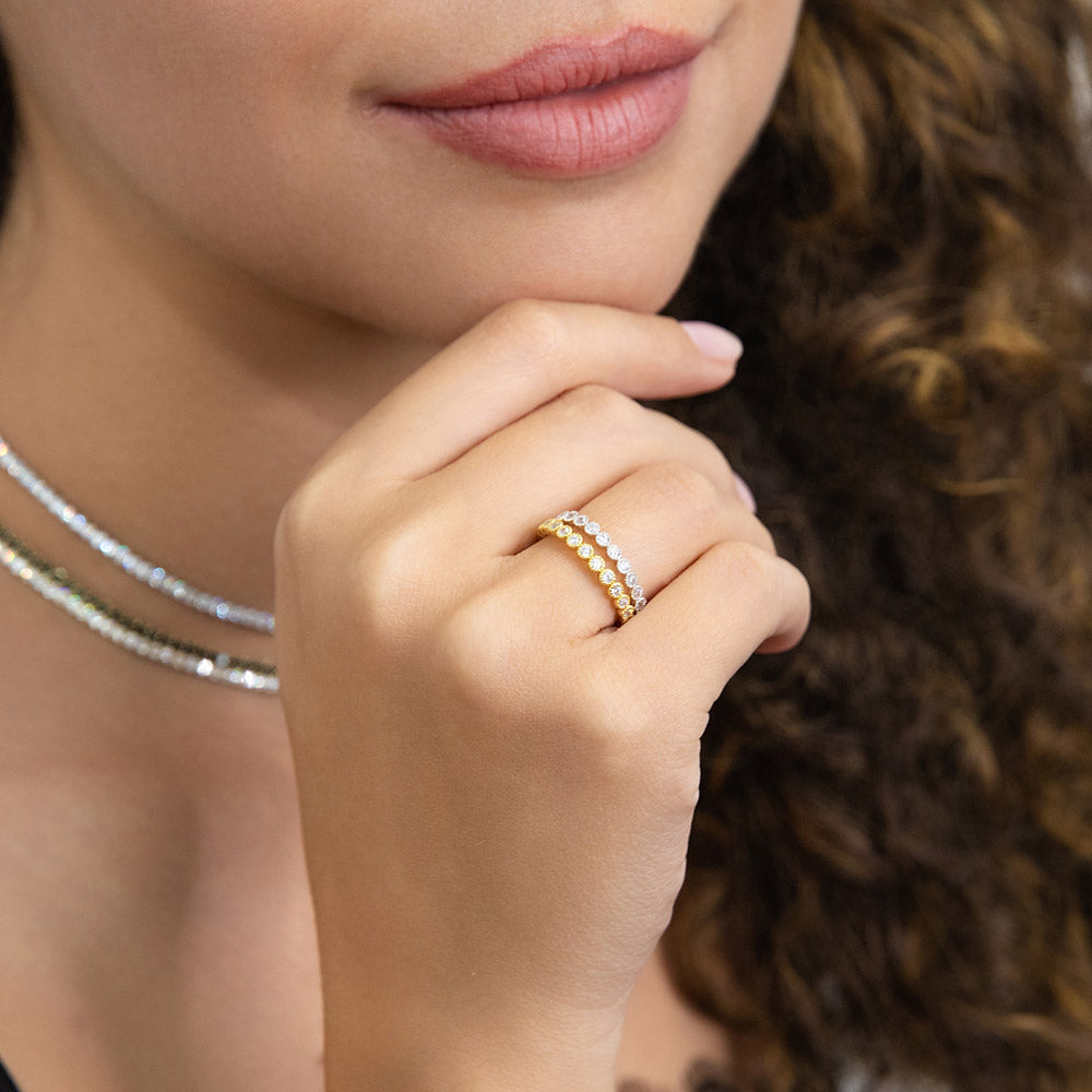 Model wearing Bubble Bezel CZ Eternity Ring Set in Gold Flashed Sterling Silver, 2 of 13