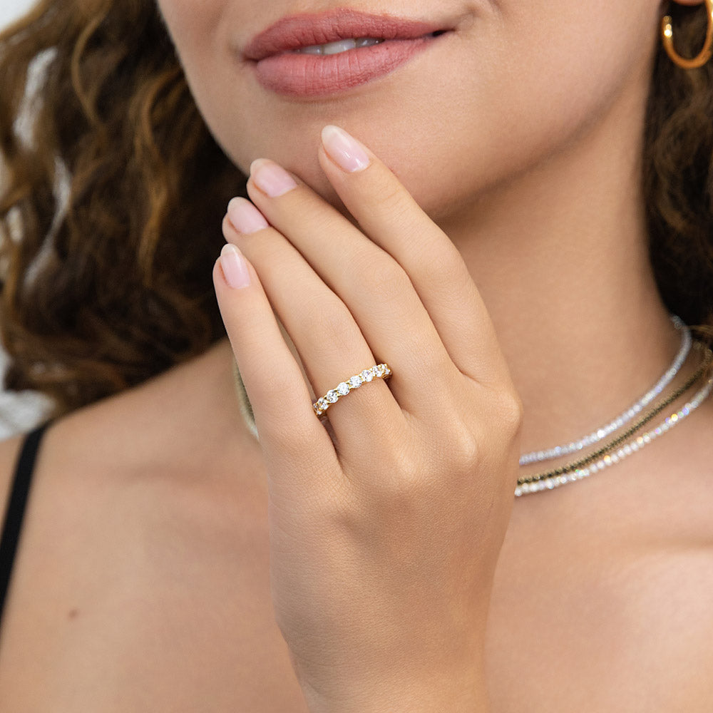 Model wearing Pave CZ Eternity Ring in Gold Flashed Sterling Silver, 2 of 8
