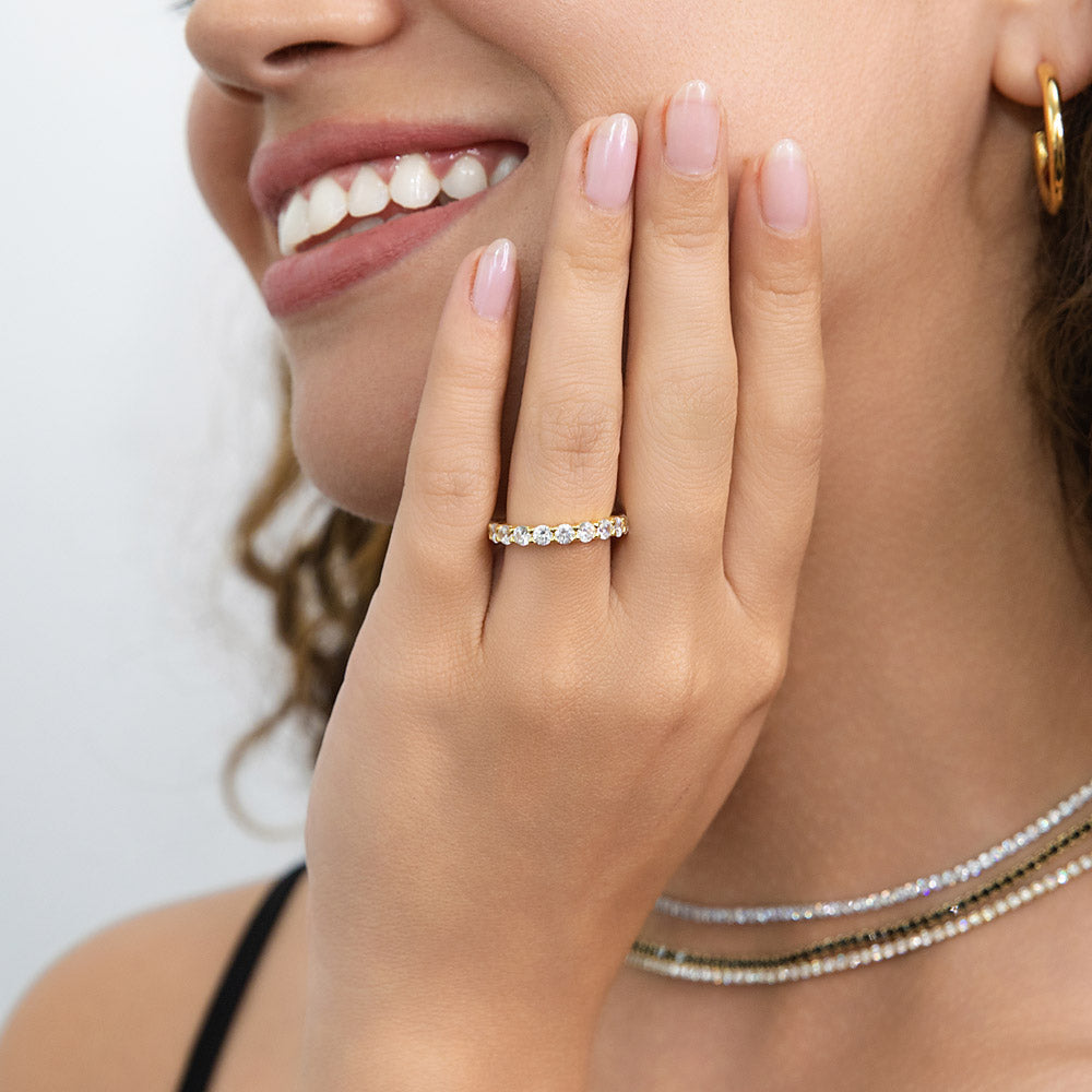Model wearing Pave CZ Eternity Ring in Gold Flashed Sterling Silver, 6 of 8