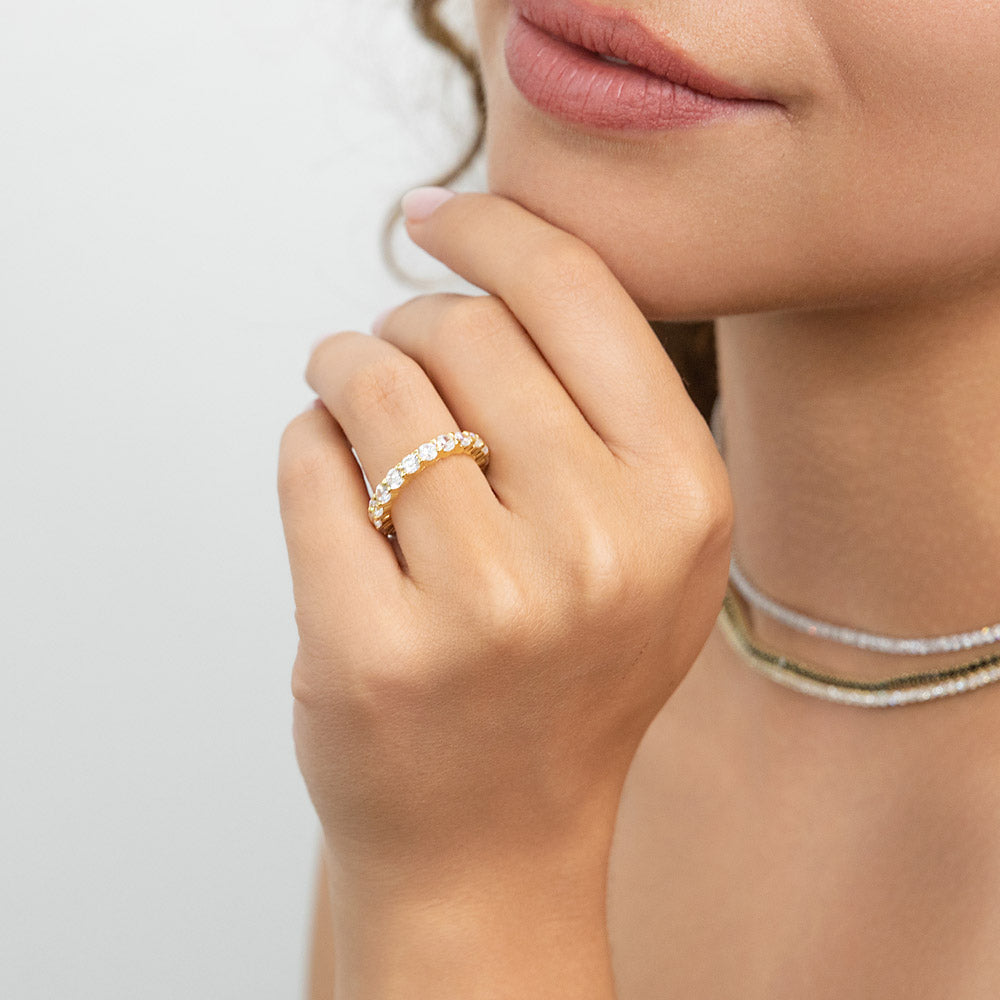 Model wearing Pave CZ Eternity Ring in Gold Flashed Sterling Silver, 3 of 8