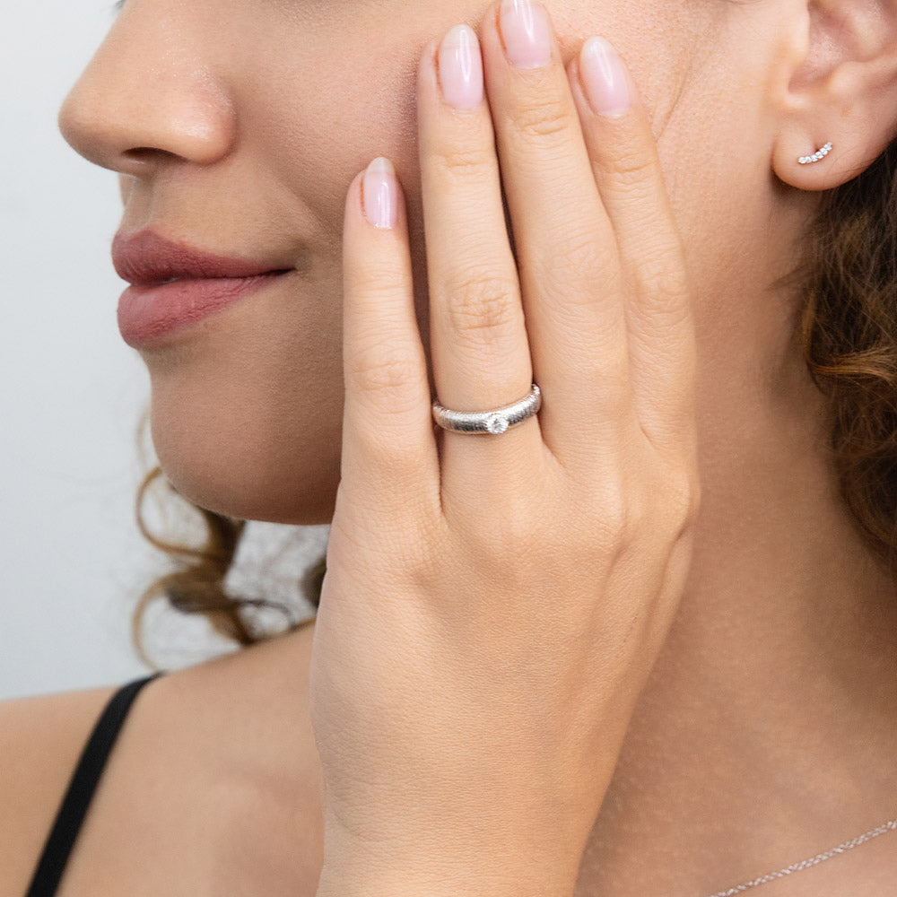 Model wearing Solitaire Bezel CZ Ring in Sterling Silver, 2 of 8
