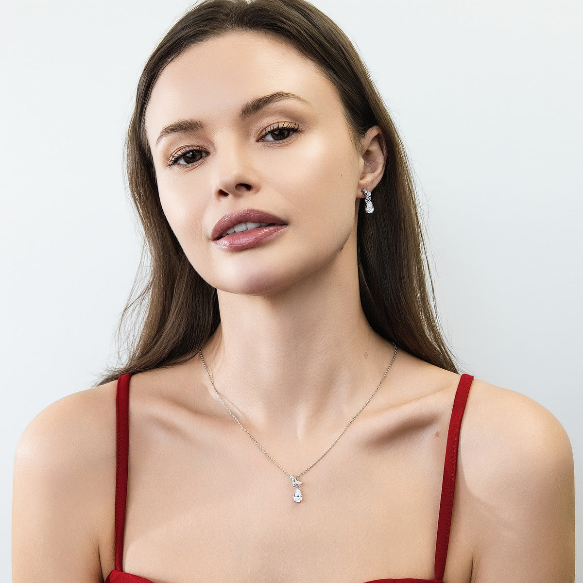 Model wearing Filigree CZ Dangle Earrings in Sterling Silver, 5 of 6