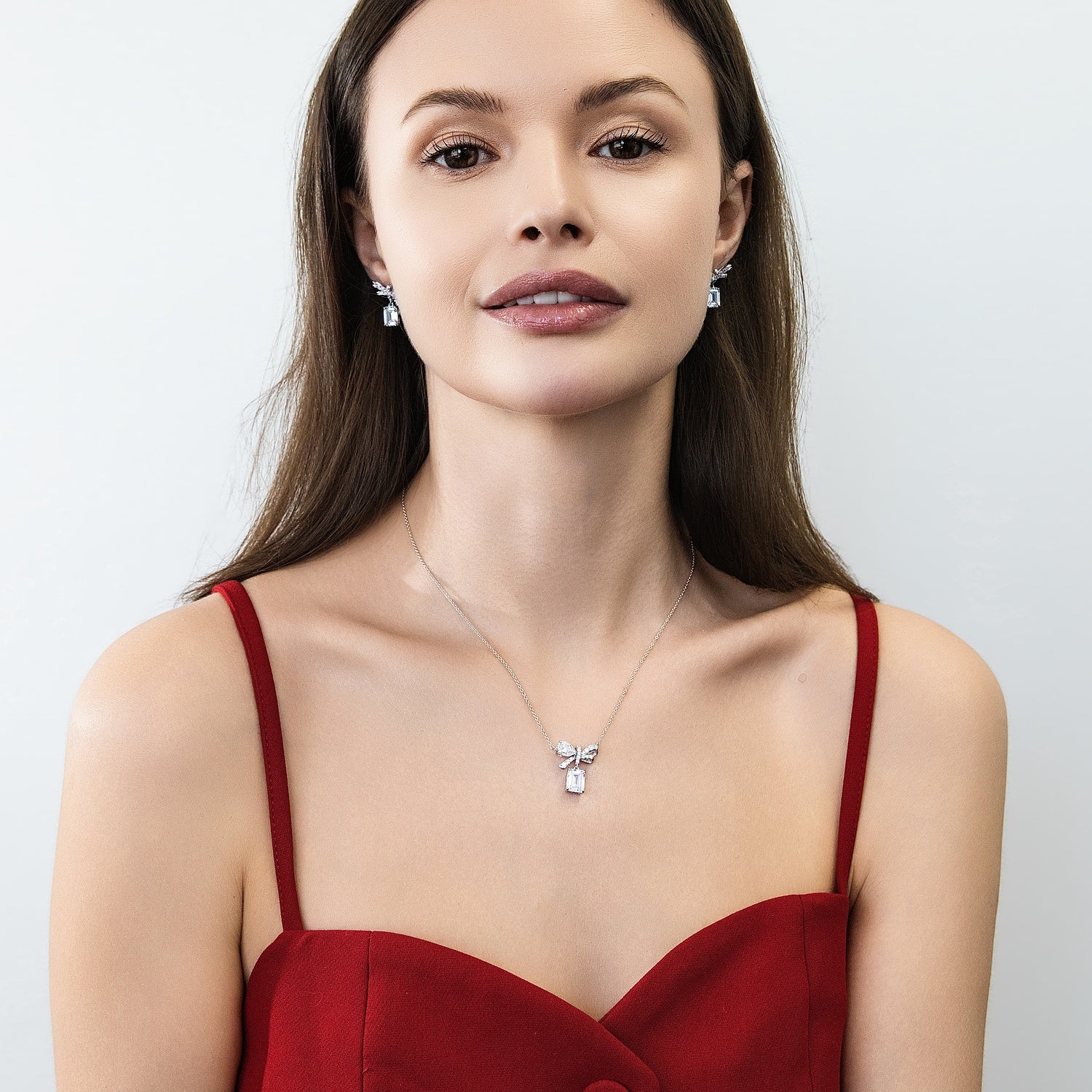 Model wearing Bow Tie Ribbon CZ Set in Sterling Silver, 8 of 11