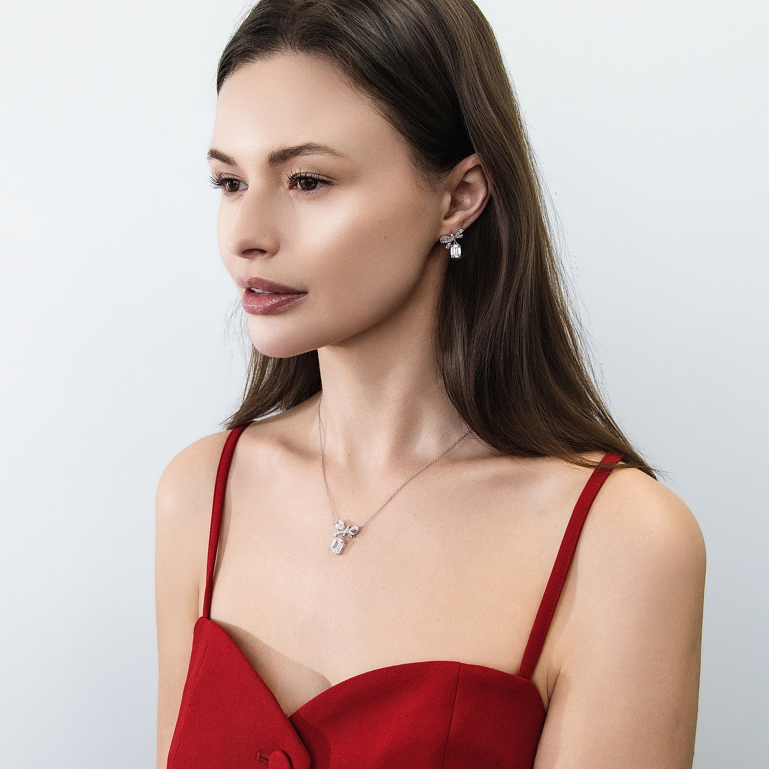 Model wearing Bow Tie Ribbon CZ Set in Sterling Silver, 11 of 11