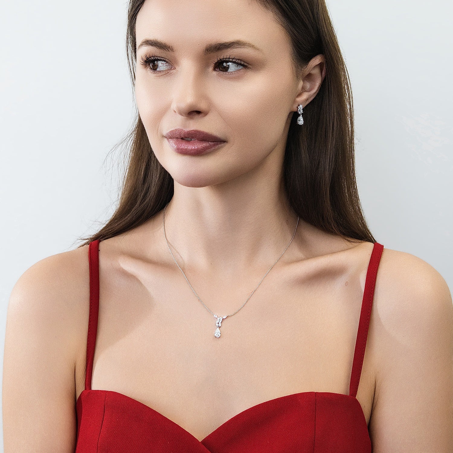 Model wearing Cluster Teardrop Navette CZ Earrings in Sterling Silver, 4 of 5
